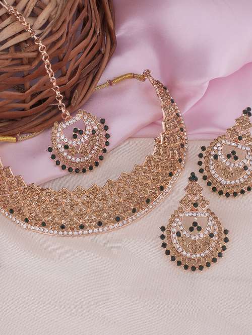 green stone studded gold plated necklace with earring and maang tikka  - 18567608 - Very Small Image - 1